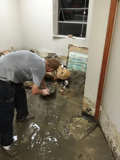 Standing storm flood water being cleaned up in a Bedford, TX home